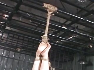 Asian teen girl gets tied up and hanged upside down in prison